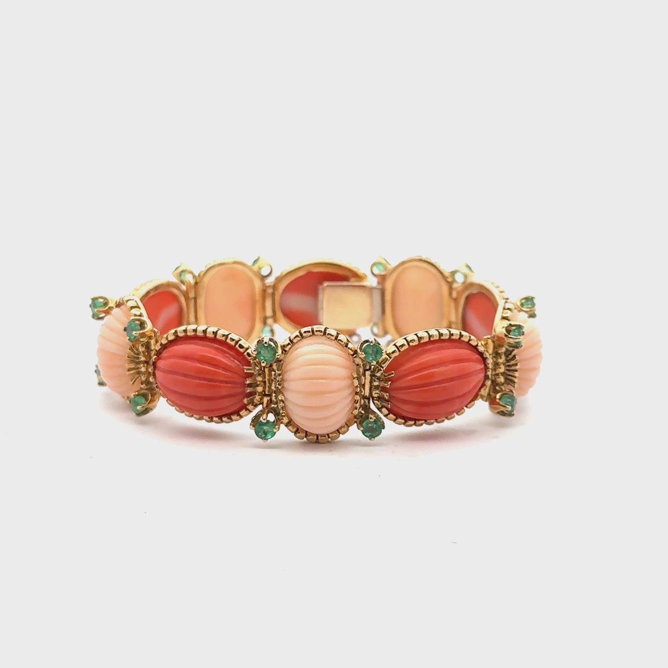 Mid-20th Century Carved Coral Emerald 18 Karat Yellow Gold Link Bracelet