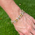 2.00 CTW Diamond 18 Karat Two Tone Gold Oval Link Bracelet