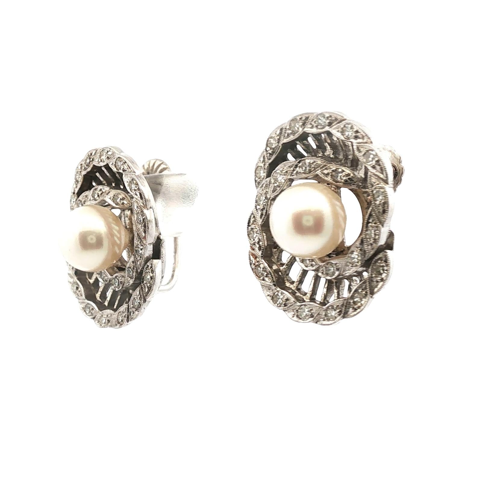 1950's  Diamond Swirl Pearl 14 Karat White Gold Screw Clip Vintage Earrings