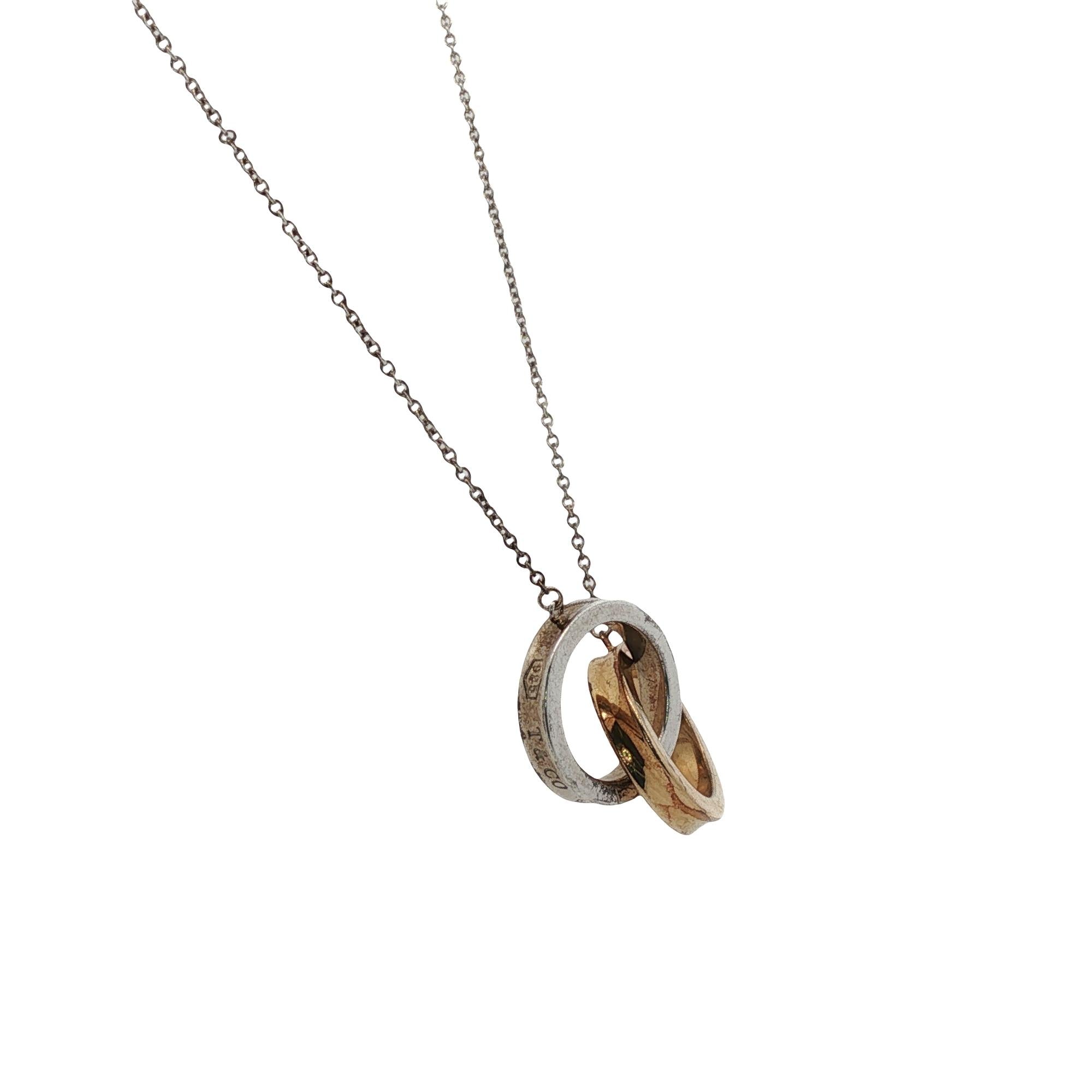 Tiffany & Co. 1837 Interlocking Rings Pendant Necklace 18KYG/SS