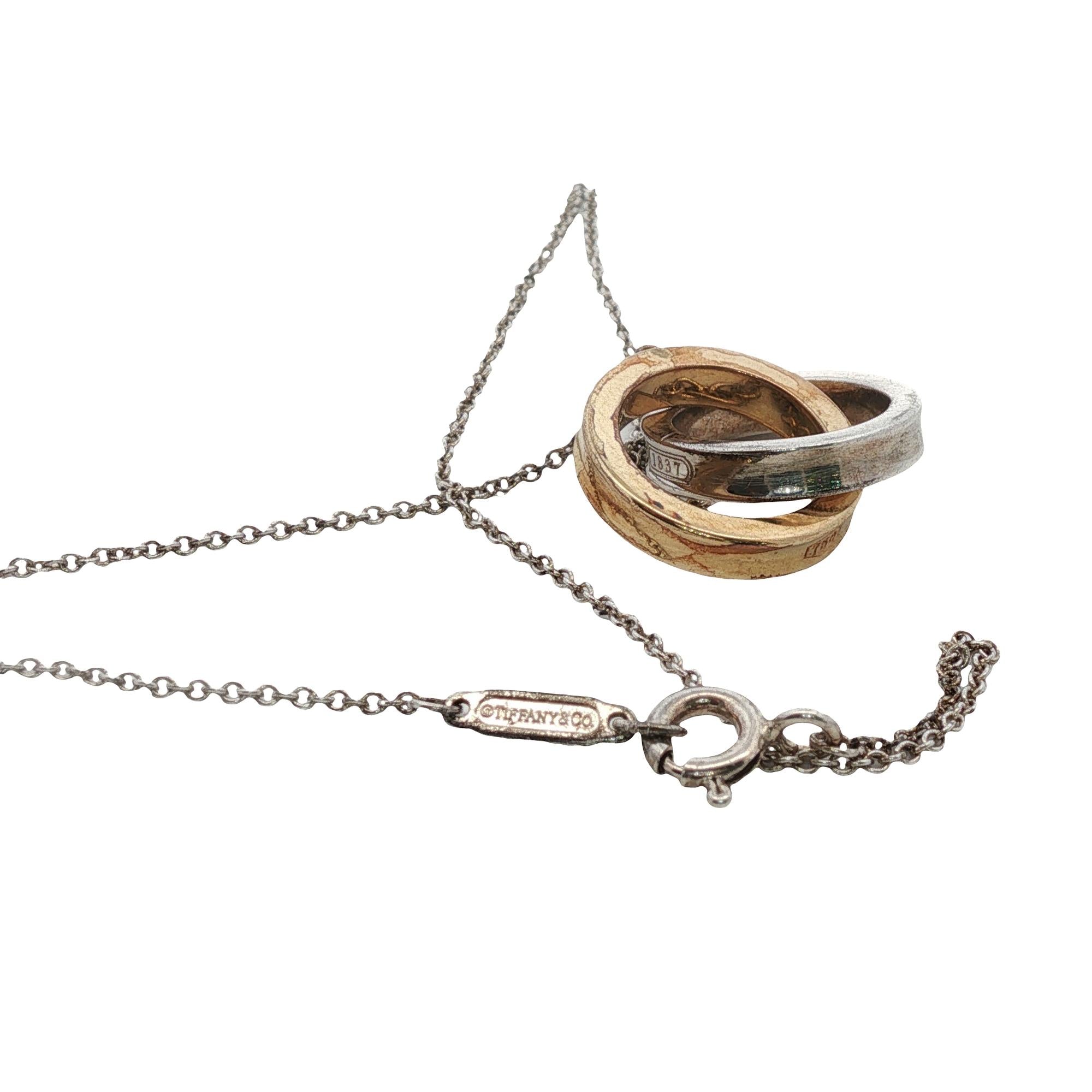 Tiffany & Co. 1837 Interlocking Rings Pendant Necklace 18KYG/SS