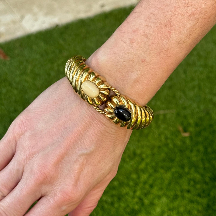 Mid-20th Century 18K Yellow Gold Ribbed Onyx Angel Skin Coral Bangle Bracelet