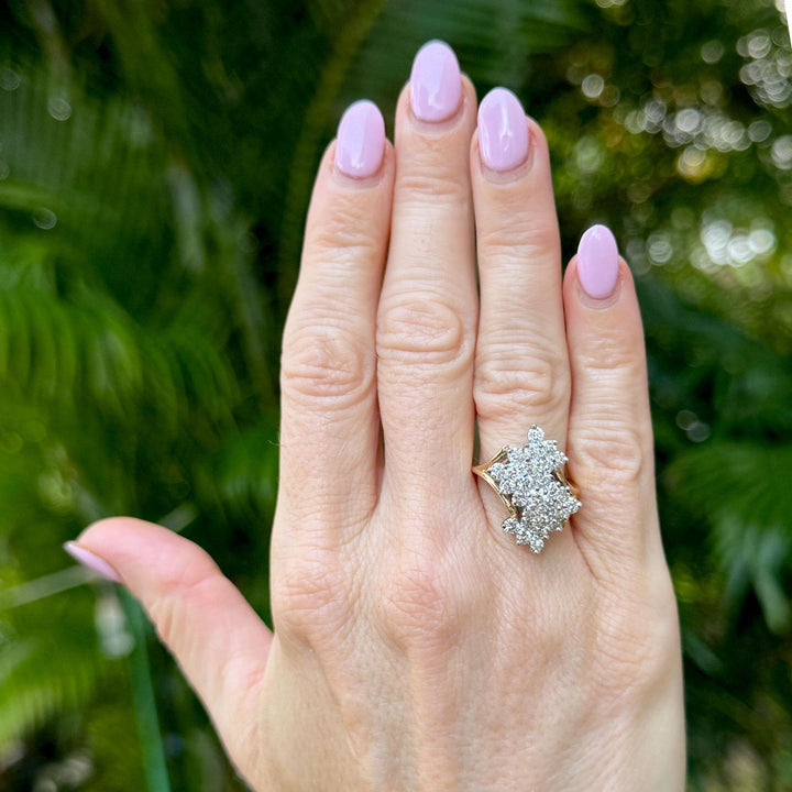 Late 20th Century Diamond 14Karat Two Tone Gold Bypass Cluster Vintage Ring