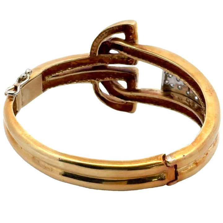 Mid-20th Century Retro 18 Karat Yellow Gold Buckle Hinged Bangle Bracelet