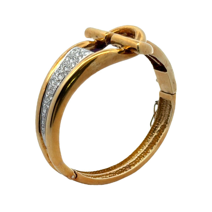 Mid-20th Century Retro 18 Karat Yellow Gold Buckle Hinged Bangle Bracelet